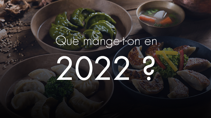 Que mange-t-on en 2022? titre sur un fond de nourriture 